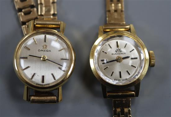 A ladys Omega 9ct gold wristwatch and a similar Bucherer wristwatch, both with 9ct gold bracelets.
